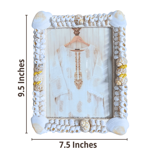 Decorative shell picture frame with measurements on a white background