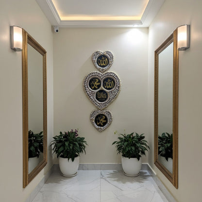 Decorative wall art with plants in a hallway setting