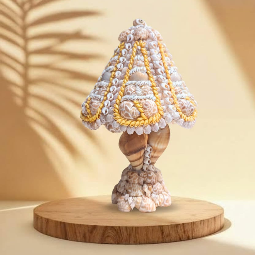 Decorative lamp made of seashells on a wooden base with a beige background