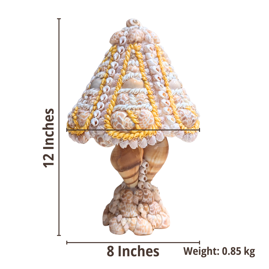 Decorative shell table lamp with measurements on a white background